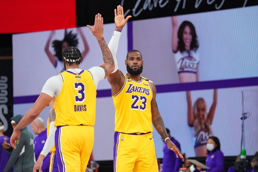 James and Davis buckled down to work in the second half of the Lakers’ Game 4 win over the Heat. (Photo by Jesse D. Garrabrant/NBAE/Getty Images)