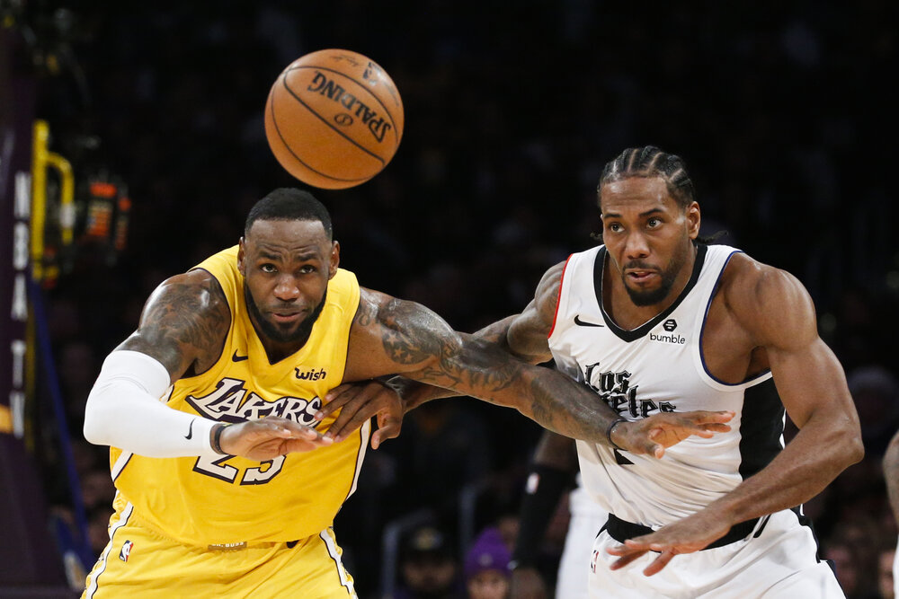 A match-up between LeBron James and Kawhi Leonard in the playoffs could have been explosive. (Photo by Ringo H.W. Chiu/AP)