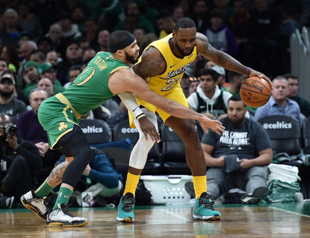 Lakers’ LeBron James making his move against Celtics’ Jayson Tatum. (Photo by Bob Dechiara/USA TODAY Sports)