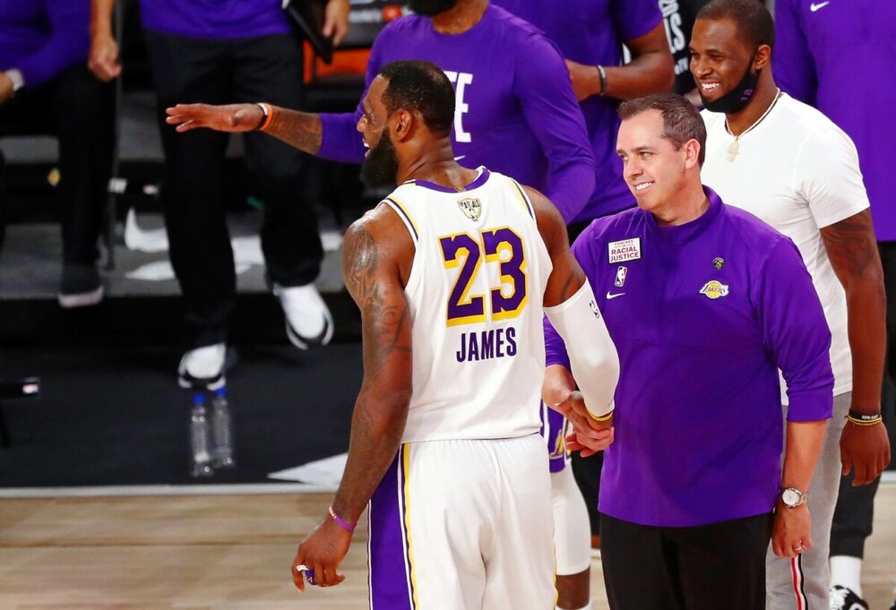 Lakers star LeBron James and head coach Frank Vogel share a laugh in the Orlando bubble. (Photo by Mike Ehrmann/AP)