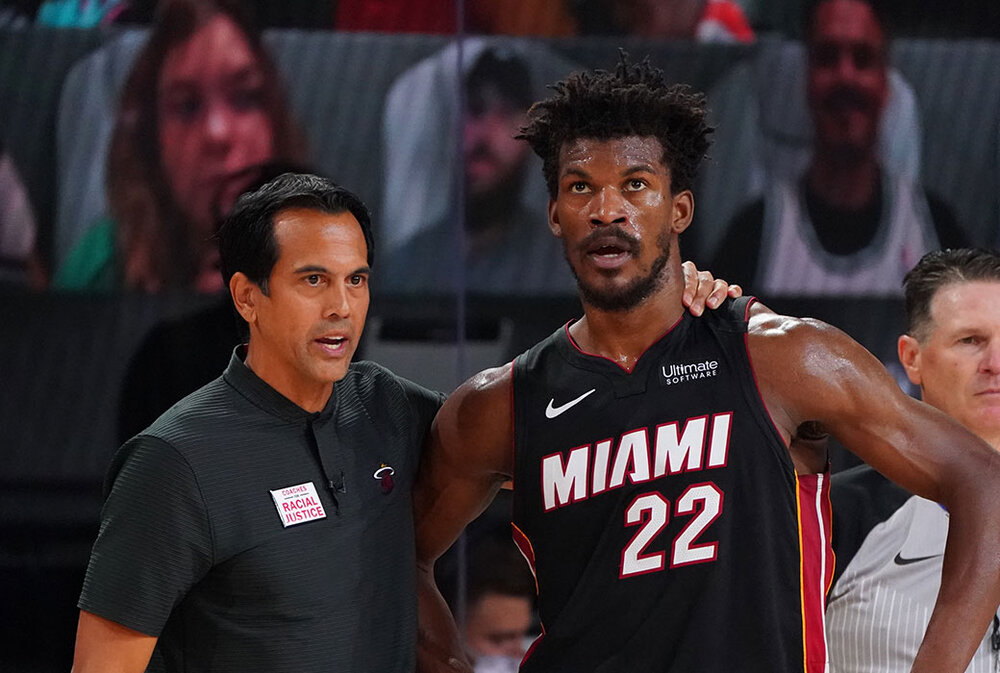Jimmy Butler and head coach Erik Spoelstra led the Heat to a Finals run this season. (Photo by Jesse D. Garrabrant/NBAE)