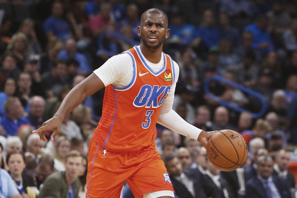 Thunder’s Chris Paul came up big in the clutch in a Game 6 win against the Rockets. (Photo by Sue Ogrocki/AP)