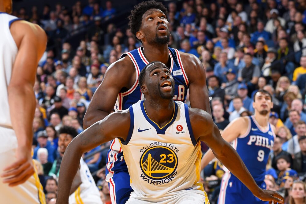 Draymond Green and Joel Embiid reacted to the blockbuster moves that happened during the 2021 NBA Trade Deadline. (Photo by Andrew D. Bernstein/Getty Images)