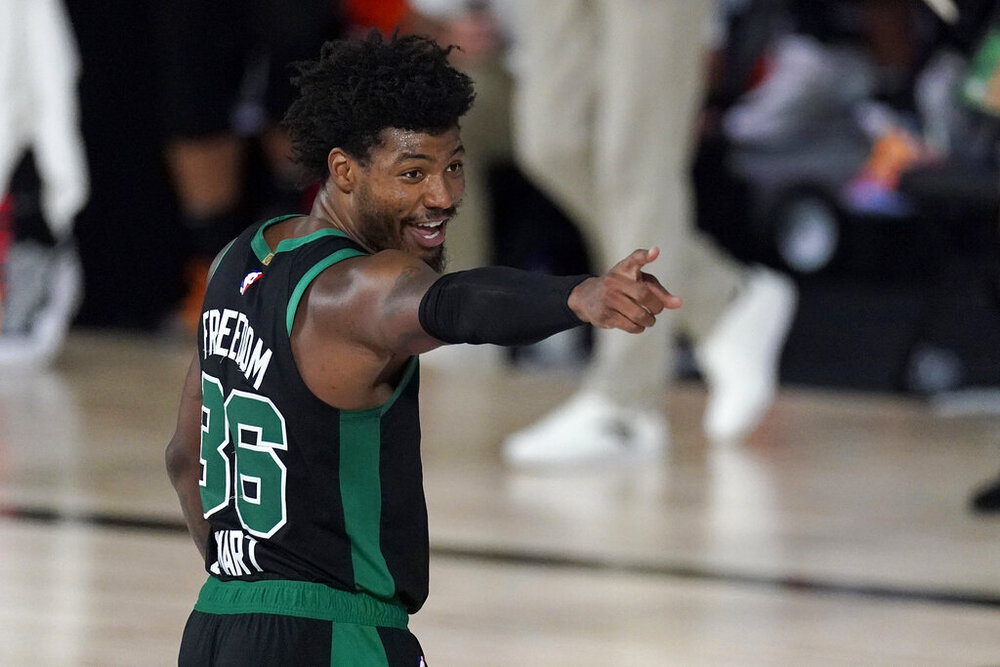 Marcus Smart’s all-around play helped Boston take Game 3 in their Eastern Conference Finals match-up against Miami. (Photo by Mark J. Terrill/AP)