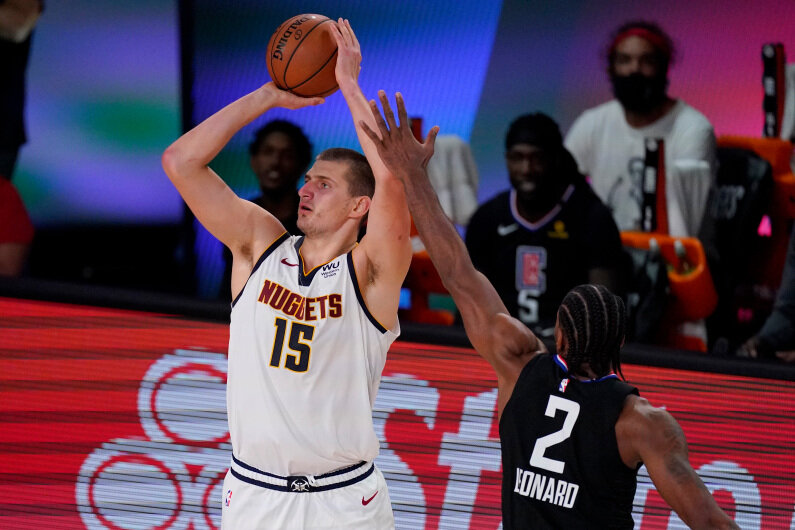 Nikola Jokic led the Denver Nuggets to a win after a disappointing Game 1 blowout. (Photo courtesy of Mark J. Terrill/Associated Press)