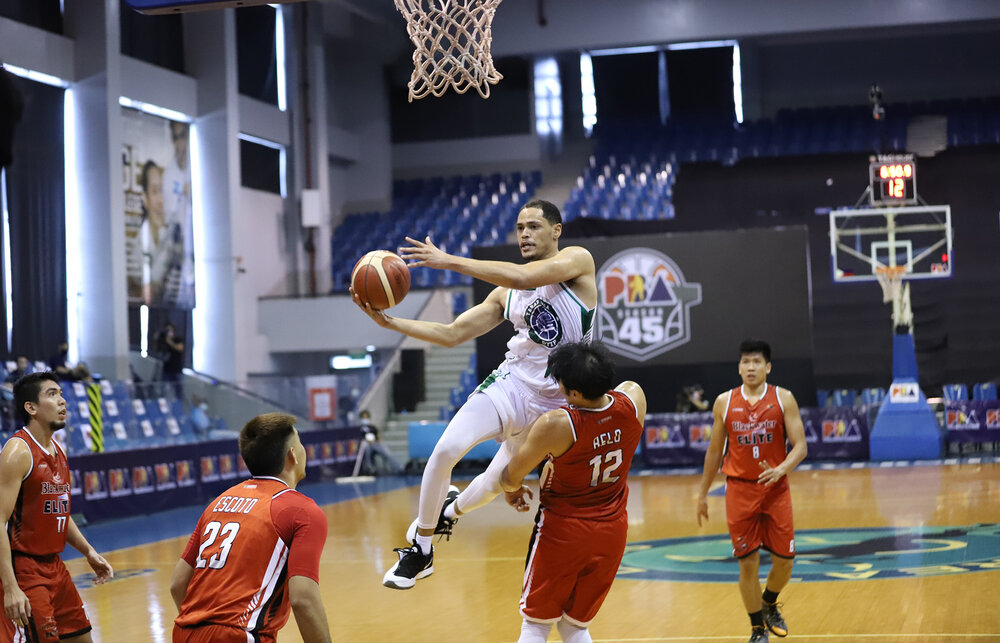 TerraFirma’s Roosevelt Adams goes up against three Blackwater defenders. (Photo from PBA)