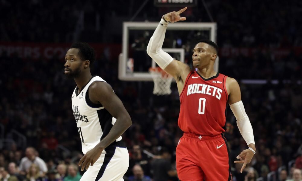 Rivals Russell Westbrook and Patrick Beverley battle it out during a Rockets-Clippers regular season game. (Photo via USA TODAY Sports)