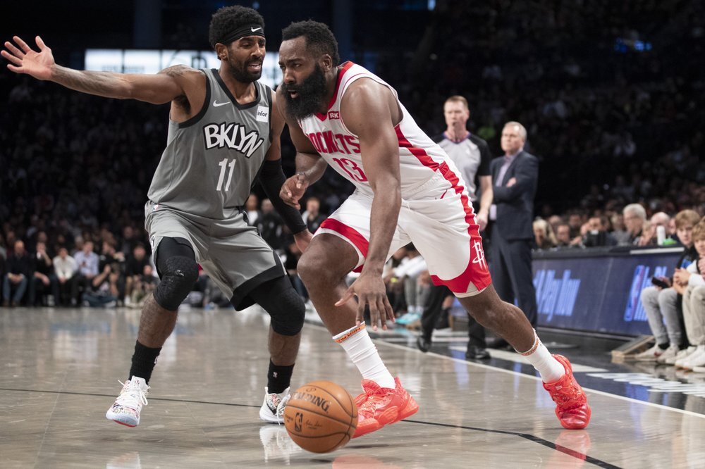 James Harden and Kyrie Irving could team up in Brooklyn. (Photo by Mary Altaffer/AP)