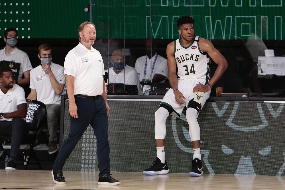 Giannis, Budenholzer and the Bucks are looking for a deeper playoff run this season. (Photo by Jim Poorten/NBAE/Getty Images)