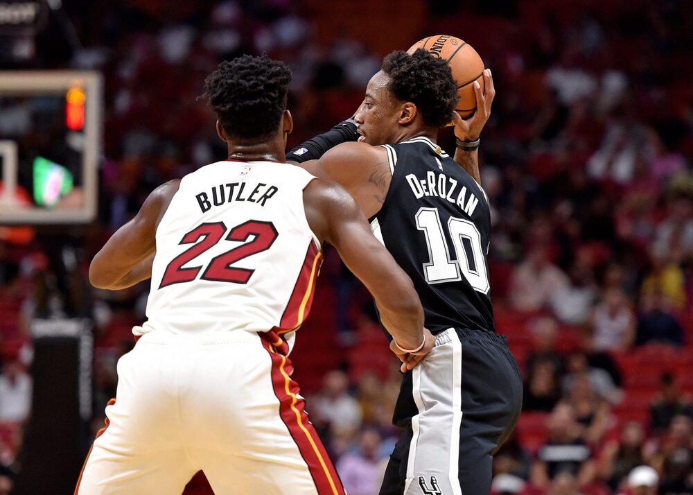 DeRozan protecting the ball from Miami’s Jimmy Butler. (Photo from USA TODAY Sports)