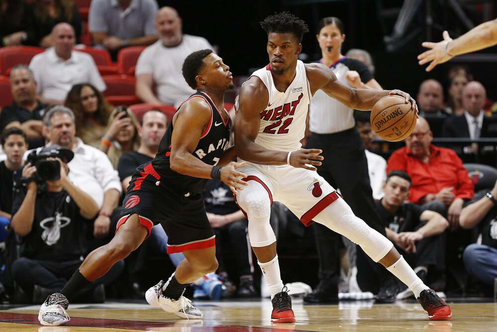 Kyle Lowry and Jimmy Butler could team up in Miami. (Photo by Michael Reaves/Getty Images)