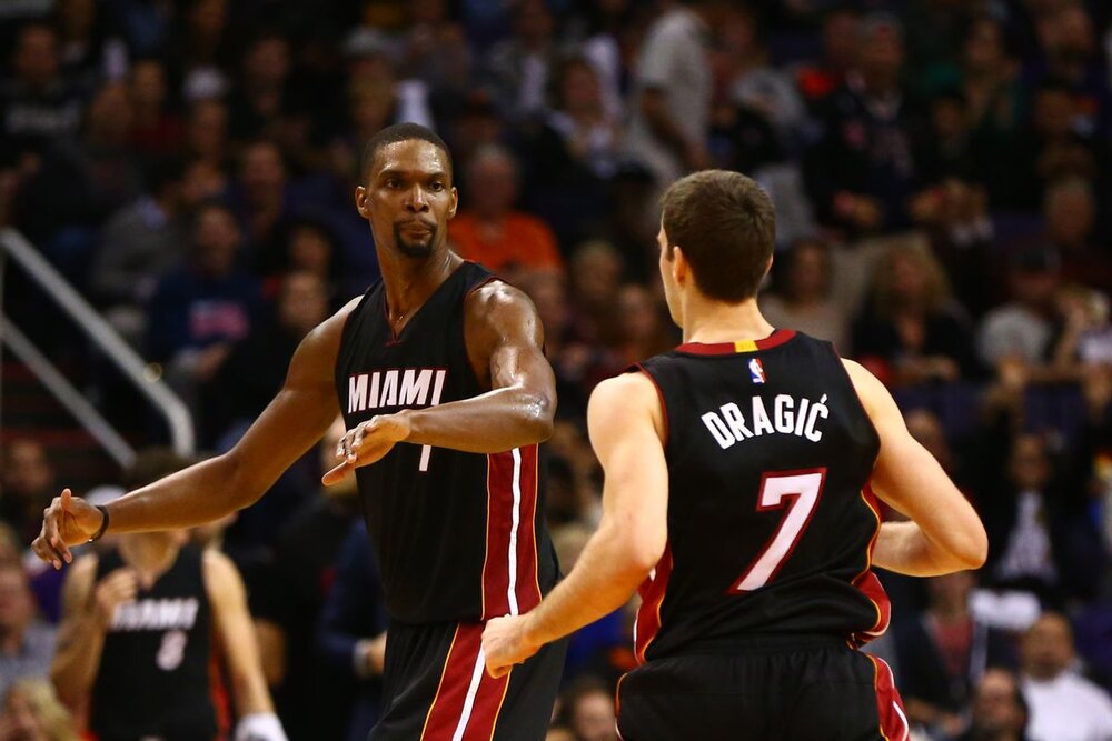 Chris Bosh and Goran Dragic were former teammates in Miami. (Photo by Mark J. Rebilas/USA TODAY Sports)