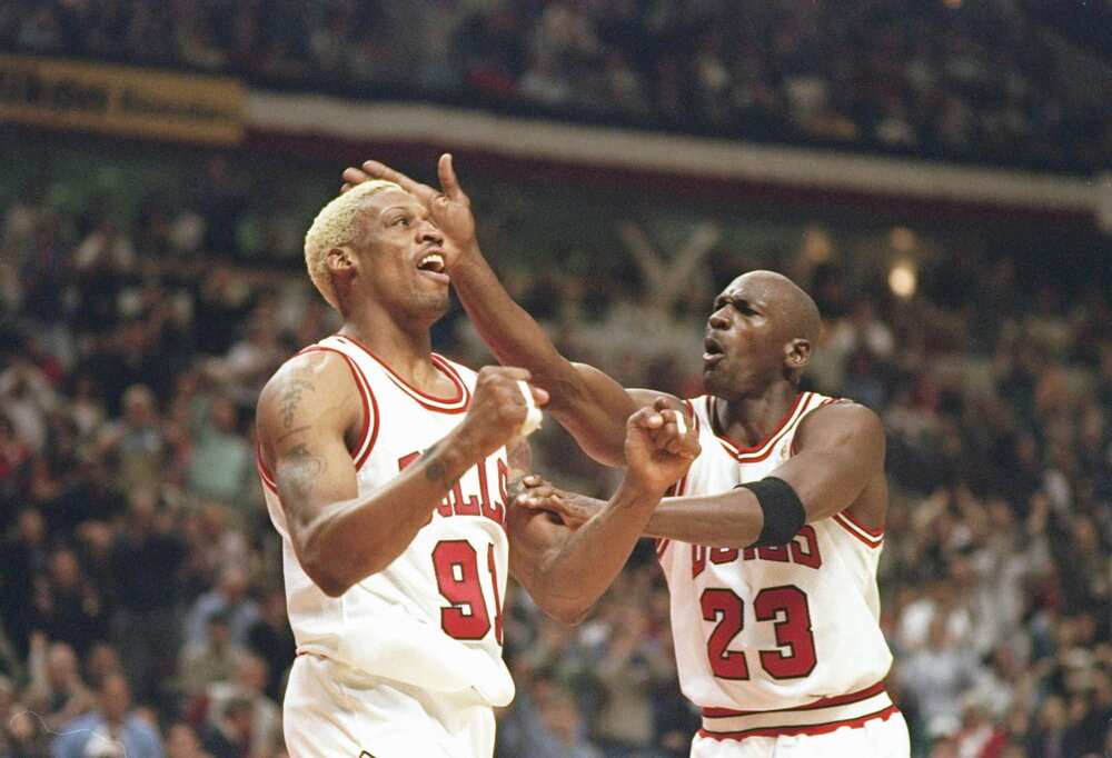 Rodman won three championships with Michael Jordan and the Chicago Bulls. (Photo by Jonathan Daniel/Allsport)