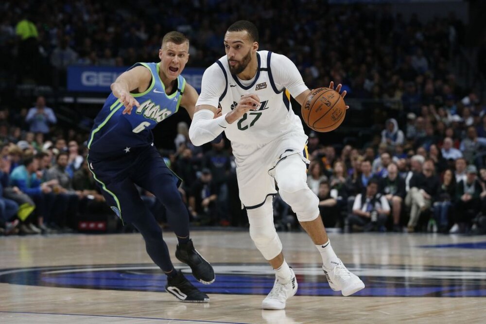 Gobert will have to find a way to mesh with Porzingis in the Mavericks’ frontcourt. (Photo via Deseret News)