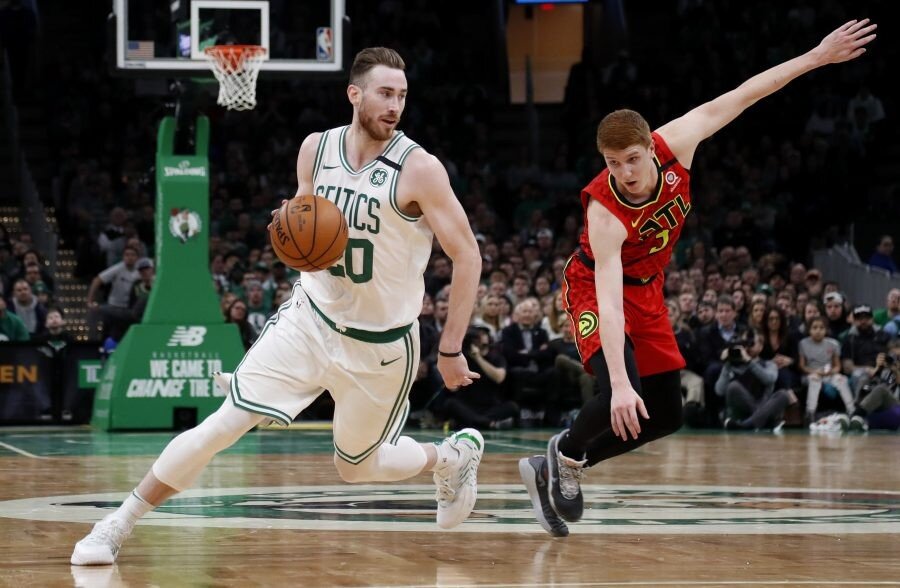 Hayward driving past Kevin Huerter of Atlanta. (Photo by Winslow Townson/USA TODAY Sports)