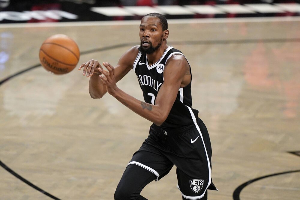 Kevin Durant is averaging a team-high 28.2 points per game for the Nets this season. (Photo by Kathy Willens/AP)