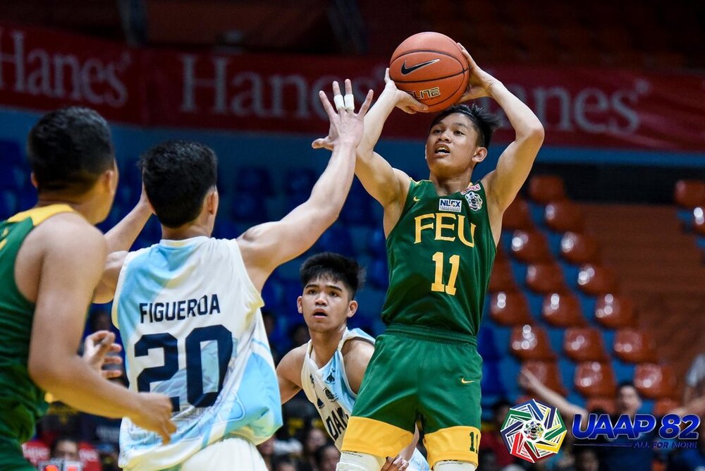 Penny puts up a jumper over UAAP Season 82 Juniors MVP Jake Figueroa of Adamson University. (Photo via Rappler )